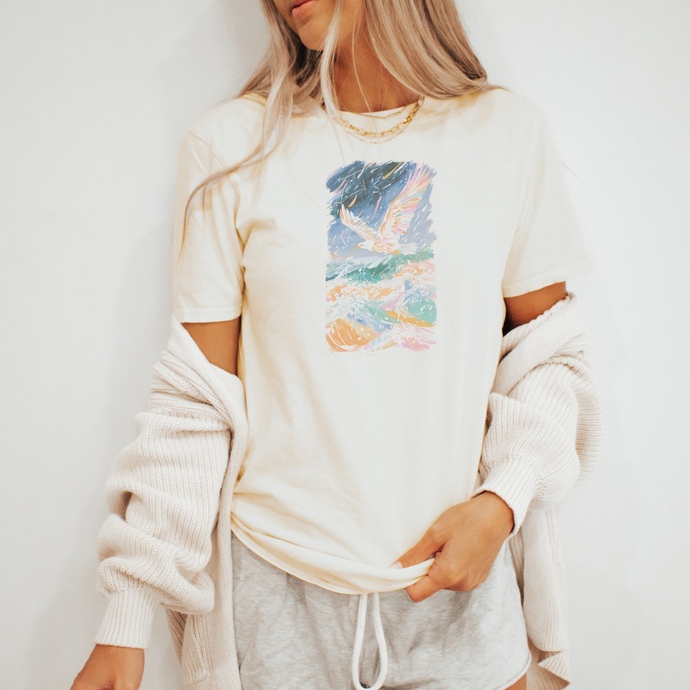 Seagull Riding the Storm Over Splattered Waves Tee